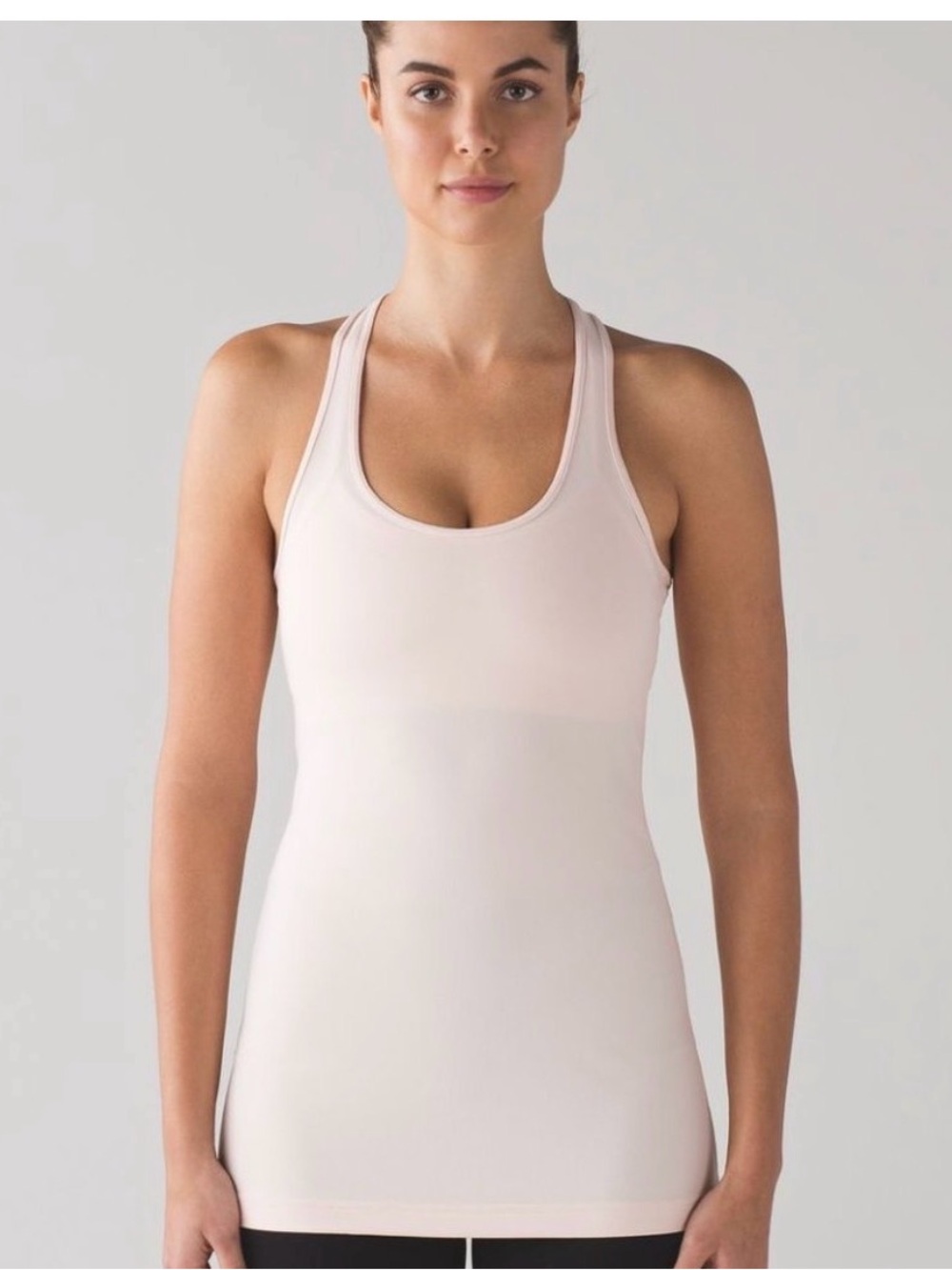 Lululemon Cool Racerback in hip length pale pink luon size 4